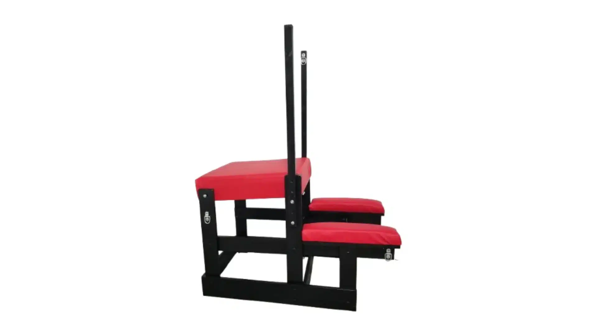 A black and red padded piece of sex furniture with a large seat and two smaller platforms at different heights, set against a plain white background.