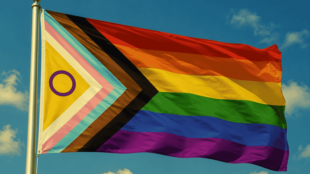 lgbtqqip2saa full acronym progress pride flag flowing in blue sky with intersex inclusive colors