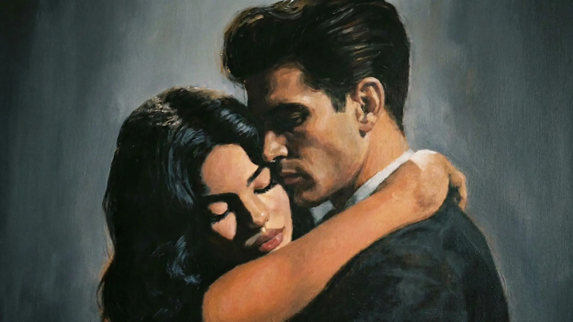 An artistic closeup of a couple embracing The woman has her eyes closed resting her head on the mans shoulder while the man holds her gently with a focused expression